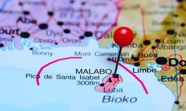 Photo of pinned Malabo on a map of Africa